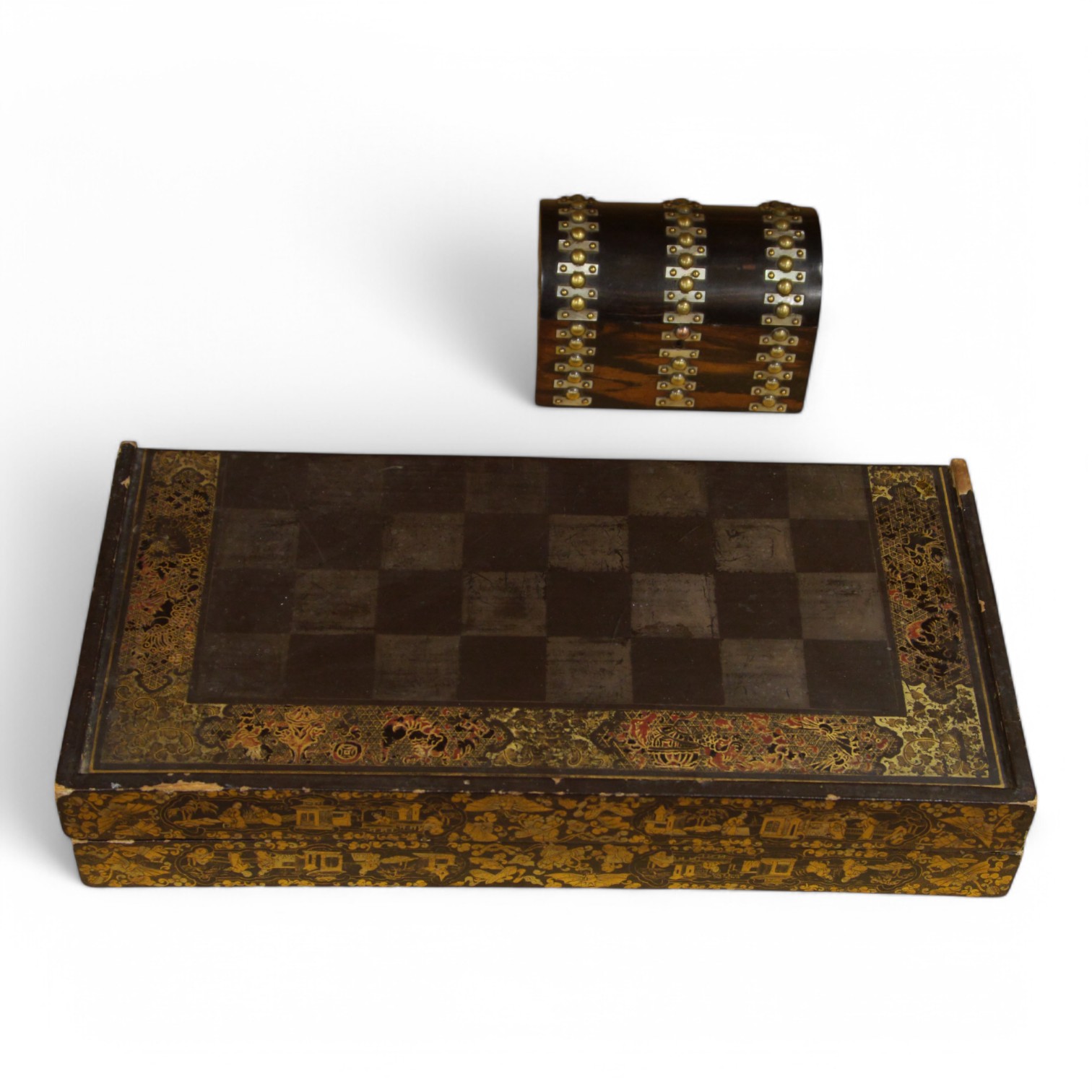 A late 19th/early 20th century Chinese lacquer chess board/box and a brass and mother of pearl mounted coromandel dome topped caddy, largest 49cm. Condition - fair